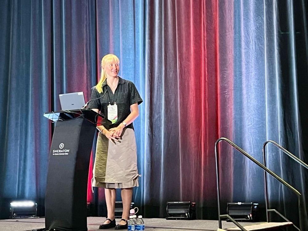 Presenting on stage at FAccT 2026